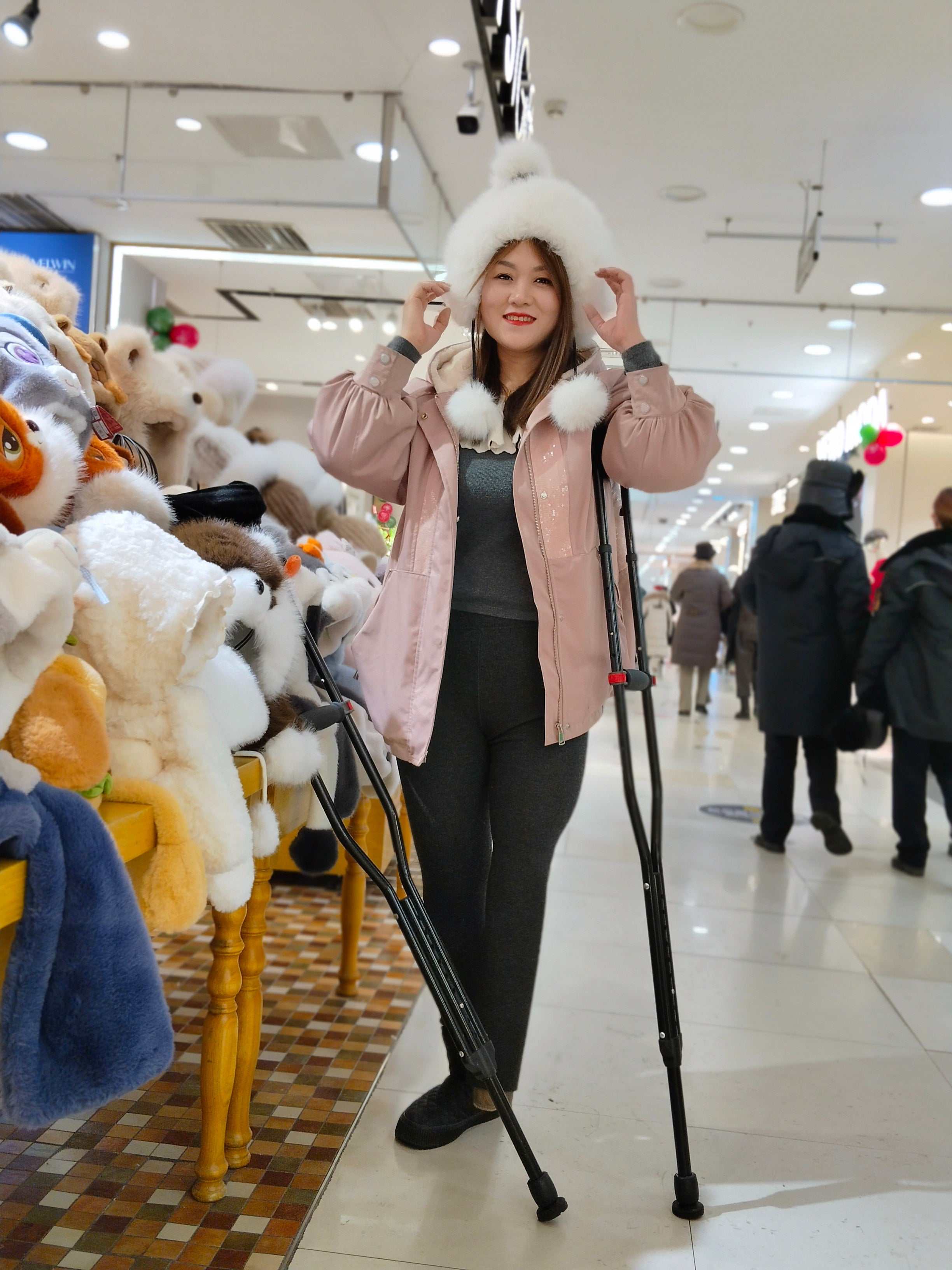 Grace, a sak girl, went shopping for shoes at the mall on crutches