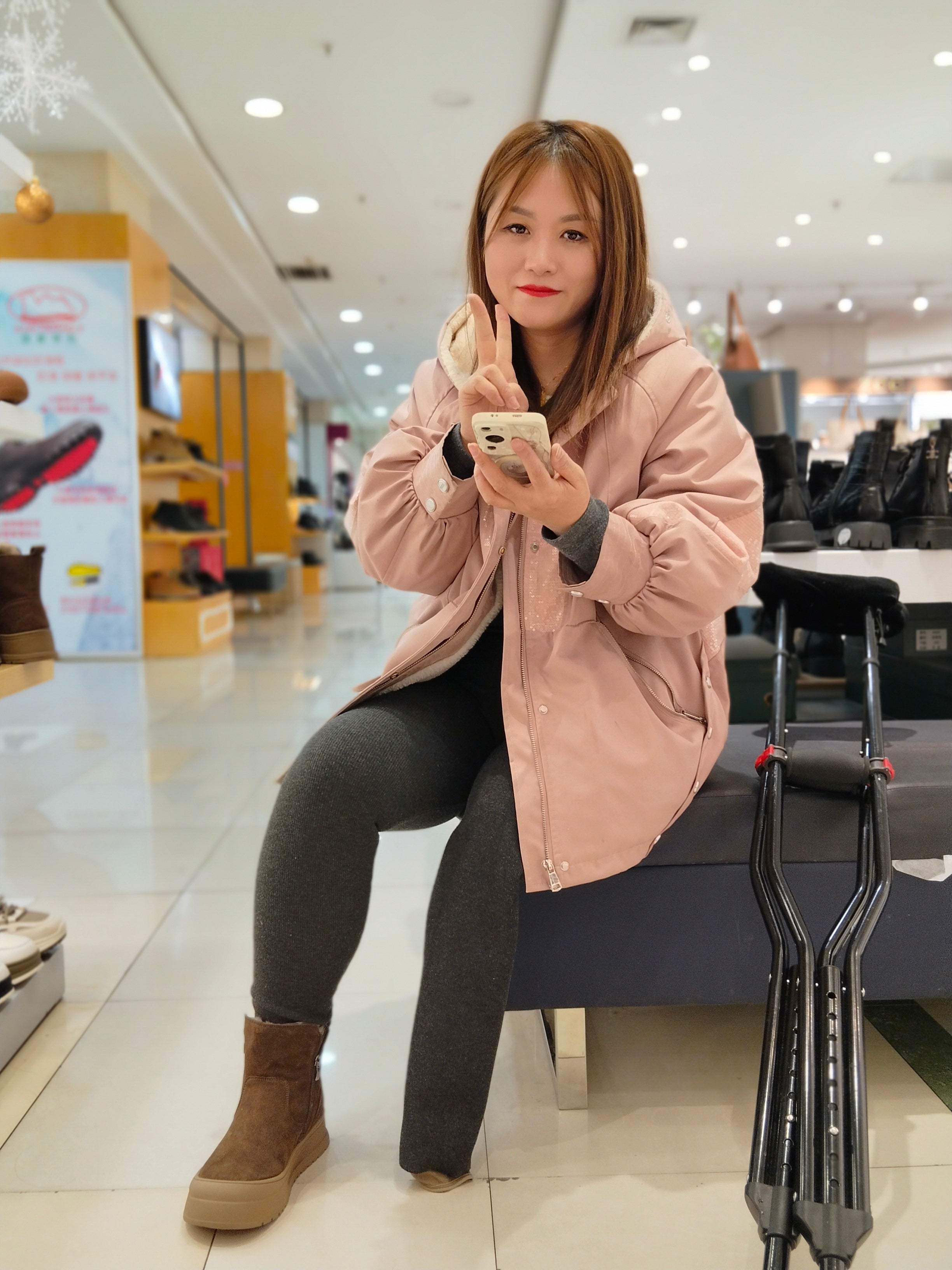 Grace, a sak girl, went shopping for shoes at the mall on crutches