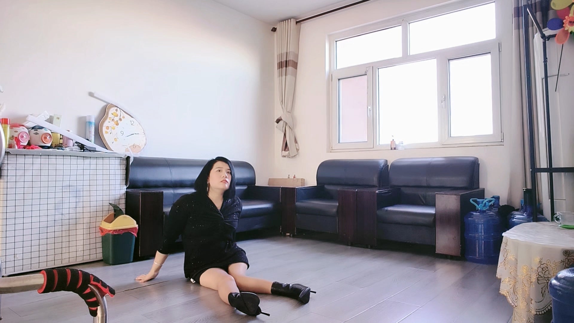 Carrie: The Polio Lady's ground-to-sofa transfer using assistive walking devices.