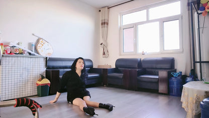 Carrie: The Polio Lady's ground-to-sofa transfer using assistive walking devices.