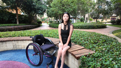 Belle: Paraplegic girl, wearing sexy outfits while exercising outdoors