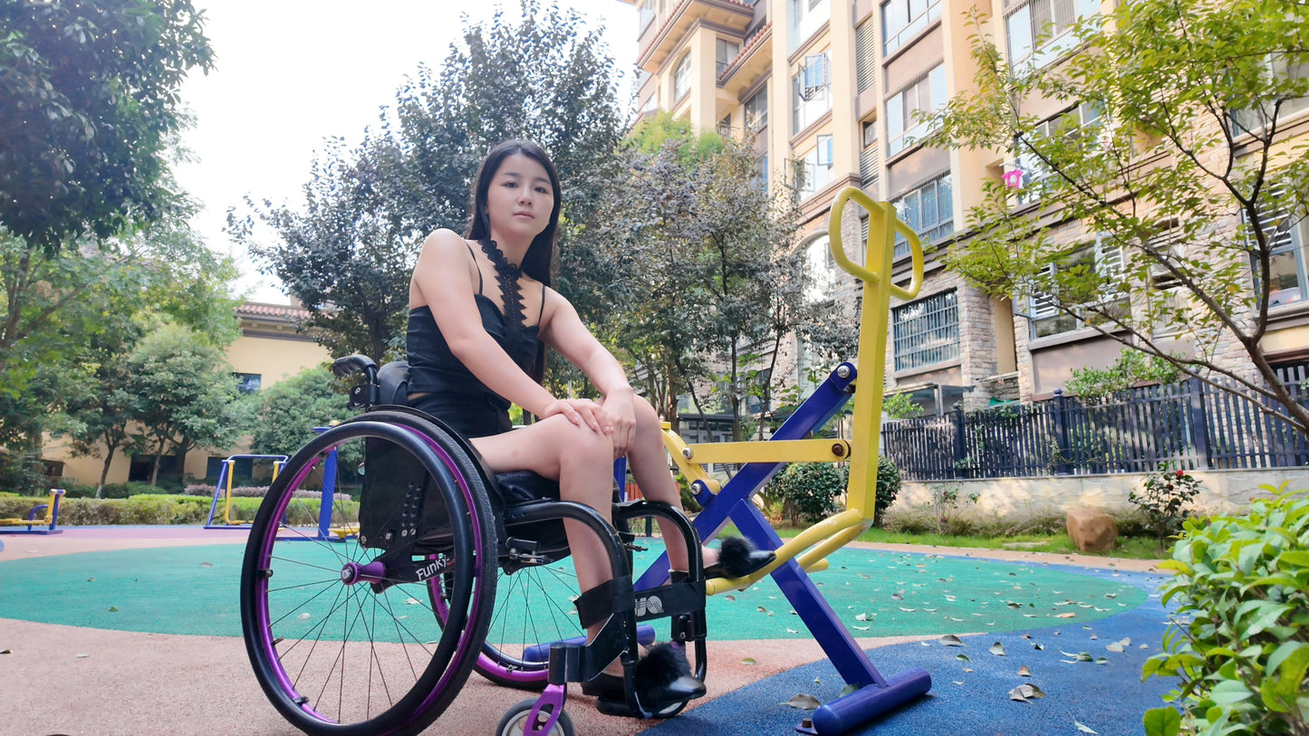 Belle: Paraplegic girl, wearing sexy outfits while exercising outdoors
