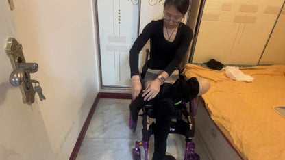 Zoe: The paraplegic girl is wearing stockings and turning over in bed