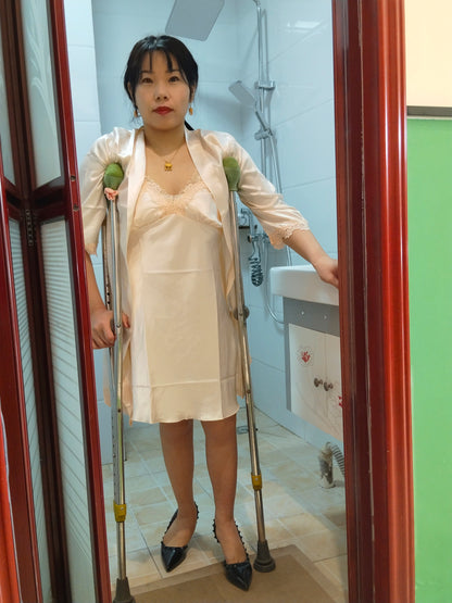 Twlia, a girl with polio - deformed leg wrapped in bandages and using crutches
