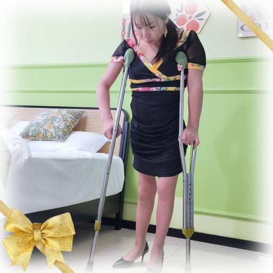 Twlia, a girl with polio - practicing walking in high heels with crutches