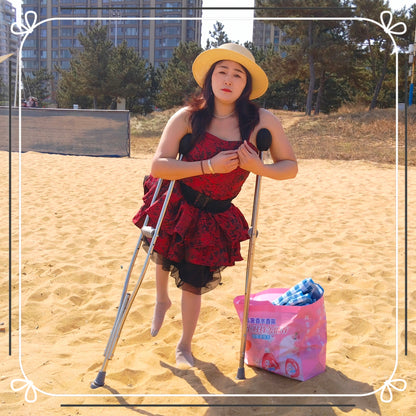 Rose the Polio Girl — Walking on the Beach with Crutches