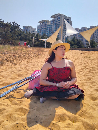 Rose the Polio Girl — Walking on the Beach with Crutches