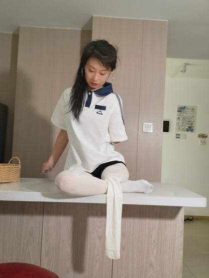 Ayla: Sak Amputee Girl - Wearing white stockings and using crutches