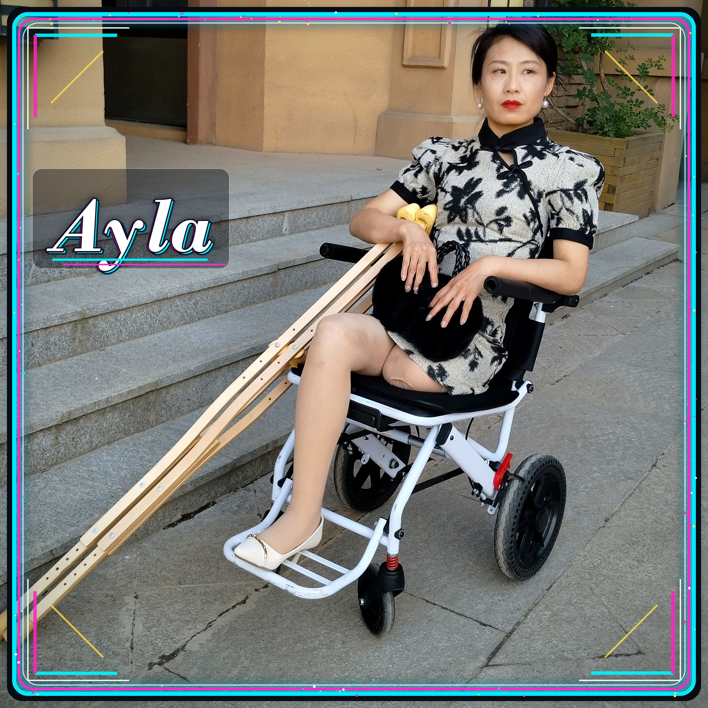 Ayla: Sak Amputee Girl - Trying out the feeling of being in a wheelchair