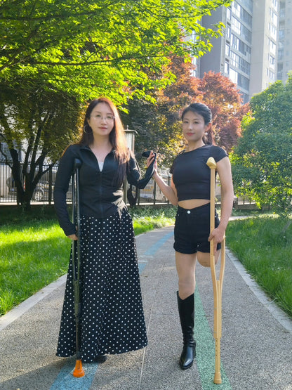 Ayla: Sak Amputee Girl – Happy times playing soccer with Lanzi while on crutches