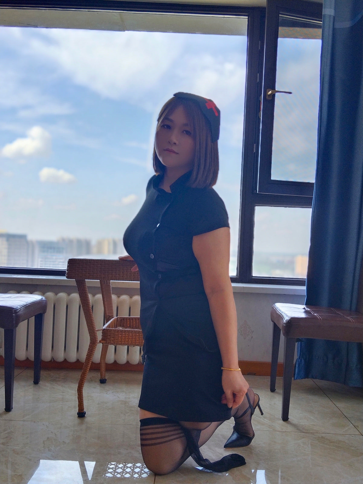 Grace, A Sak Girl – Cosplay: Nurse outfit, crutches, and black stockings.