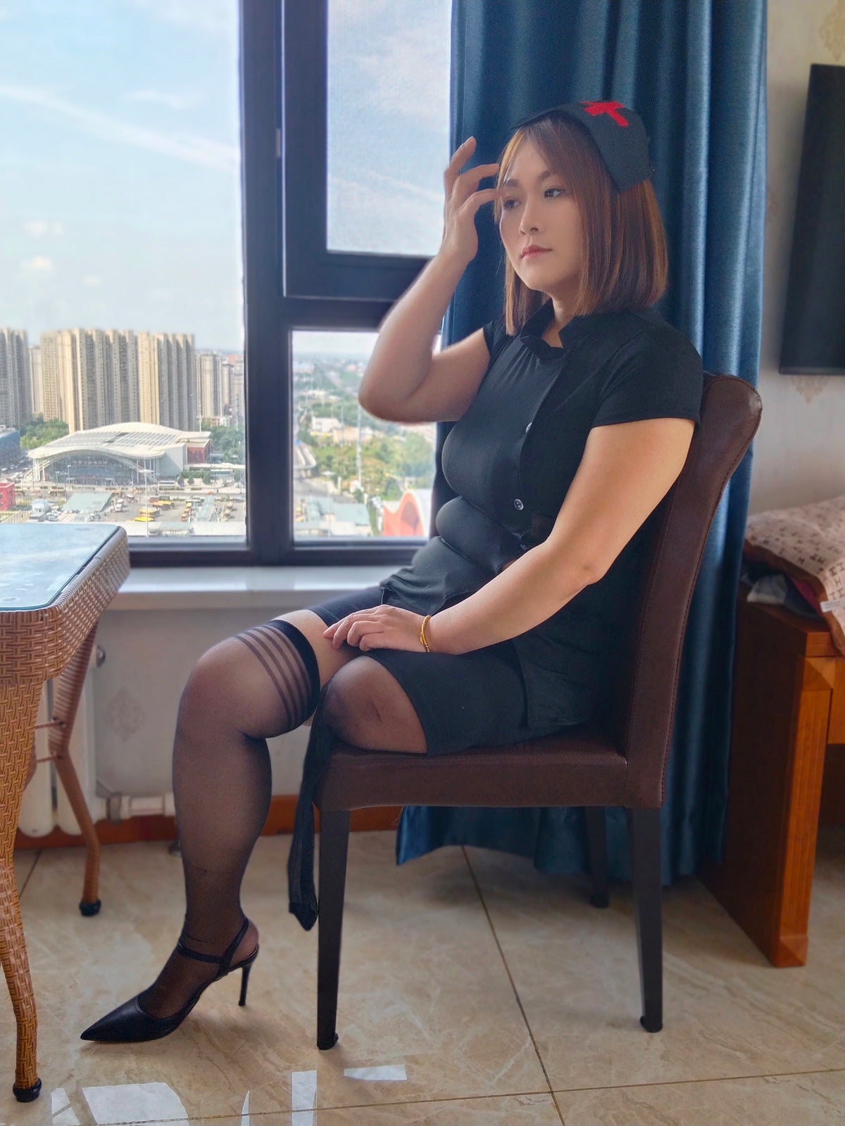 Grace, A Sak Girl – Cosplay: Nurse outfit, crutches, and black stockings.