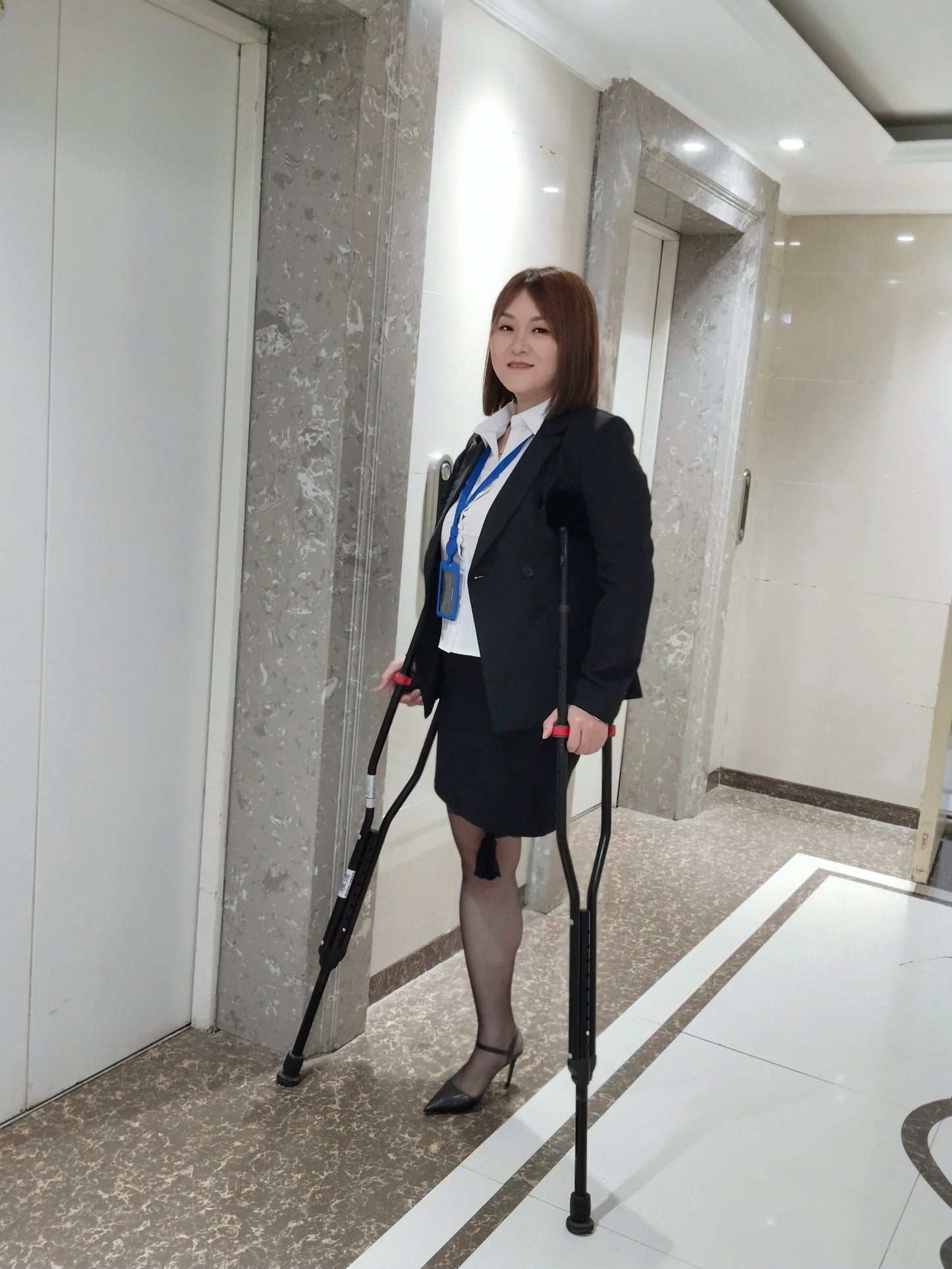 Grace, A Sak Girl - The Allure of an Office Lady in Black Stockings, High Heels, and Crutches