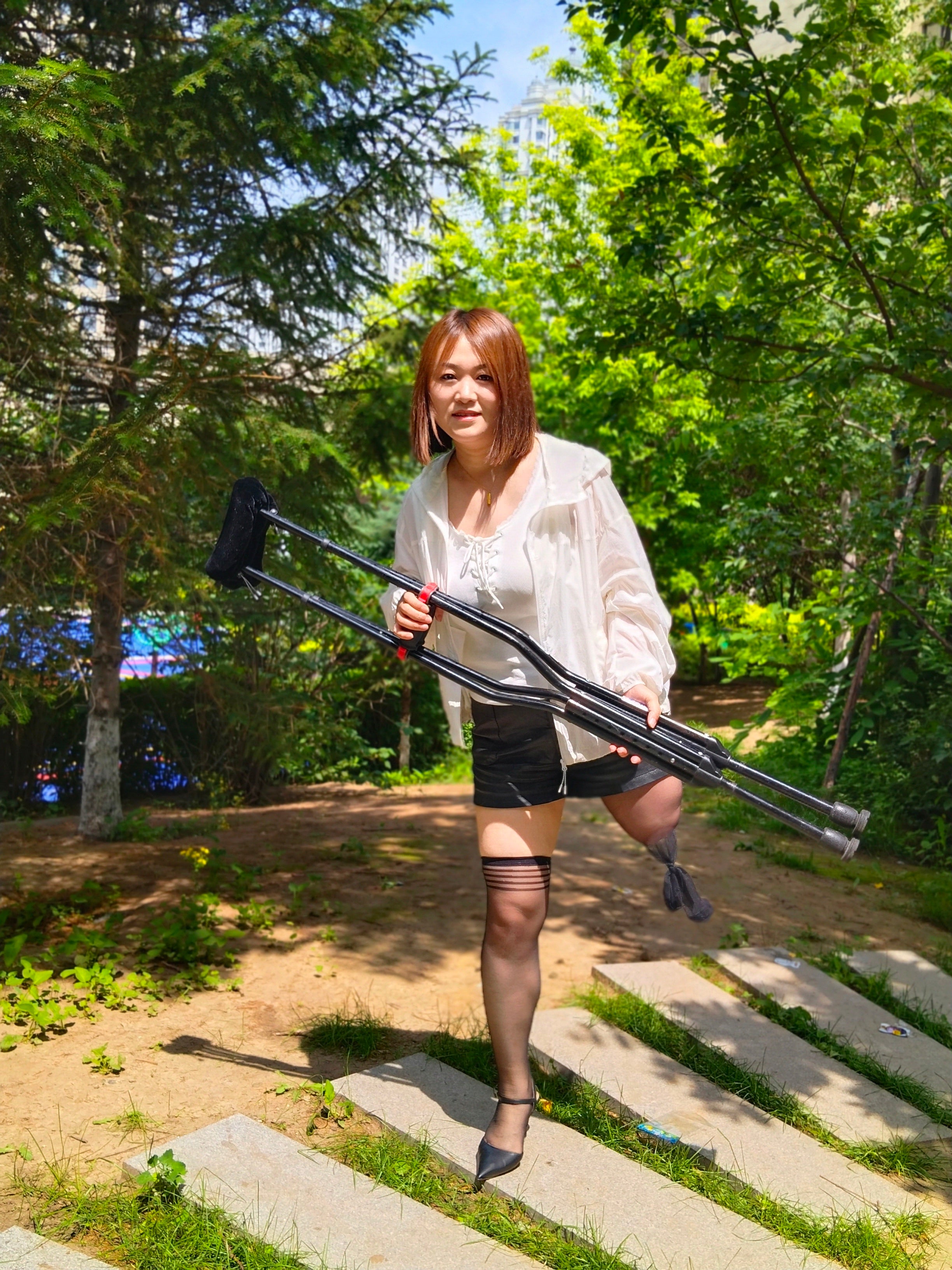 Grace, A Sak Girl - Traveling in High Heels and on a Single Cripple