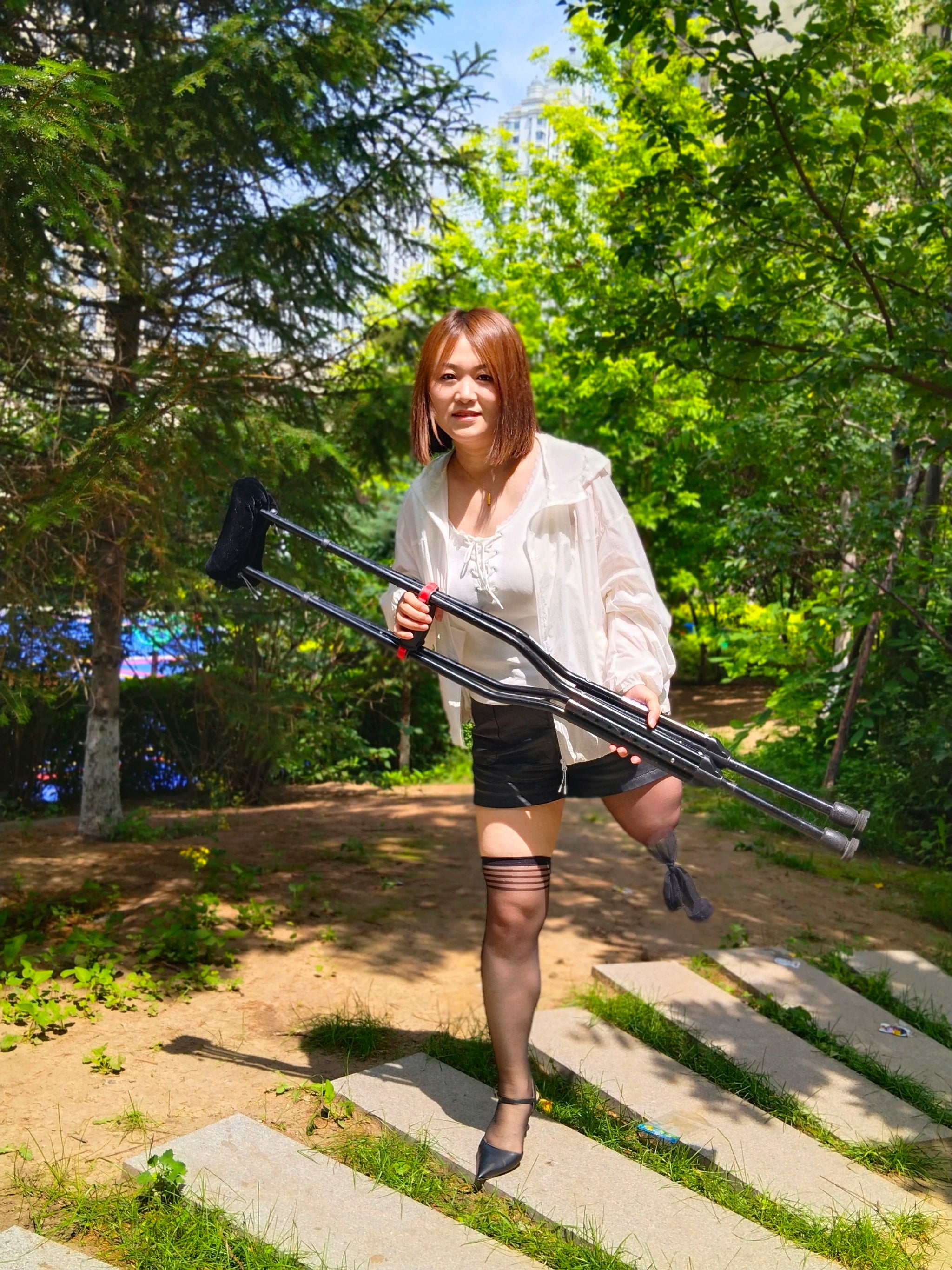 Grace, A Sak Girl - Traveling in High Heels and on a Single Cripple