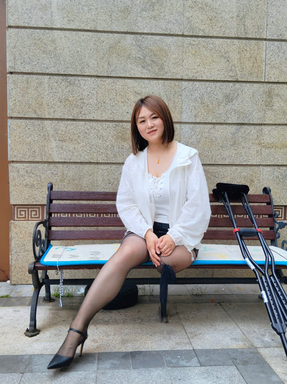 Grace, A Sak Girl - Traveling in High Heels and on a Single Cripple