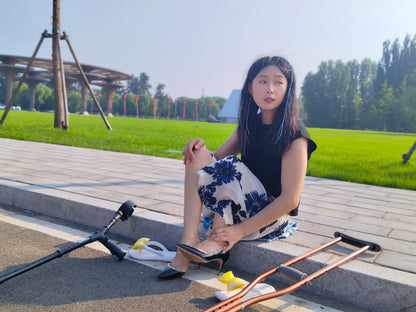 Milana the Polio Girl – Wearing High Heels on the Grass