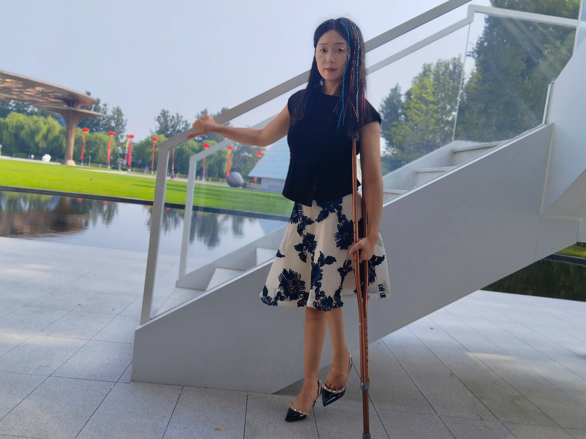 Milana the Polio Girl – Wearing High Heels on the Grass