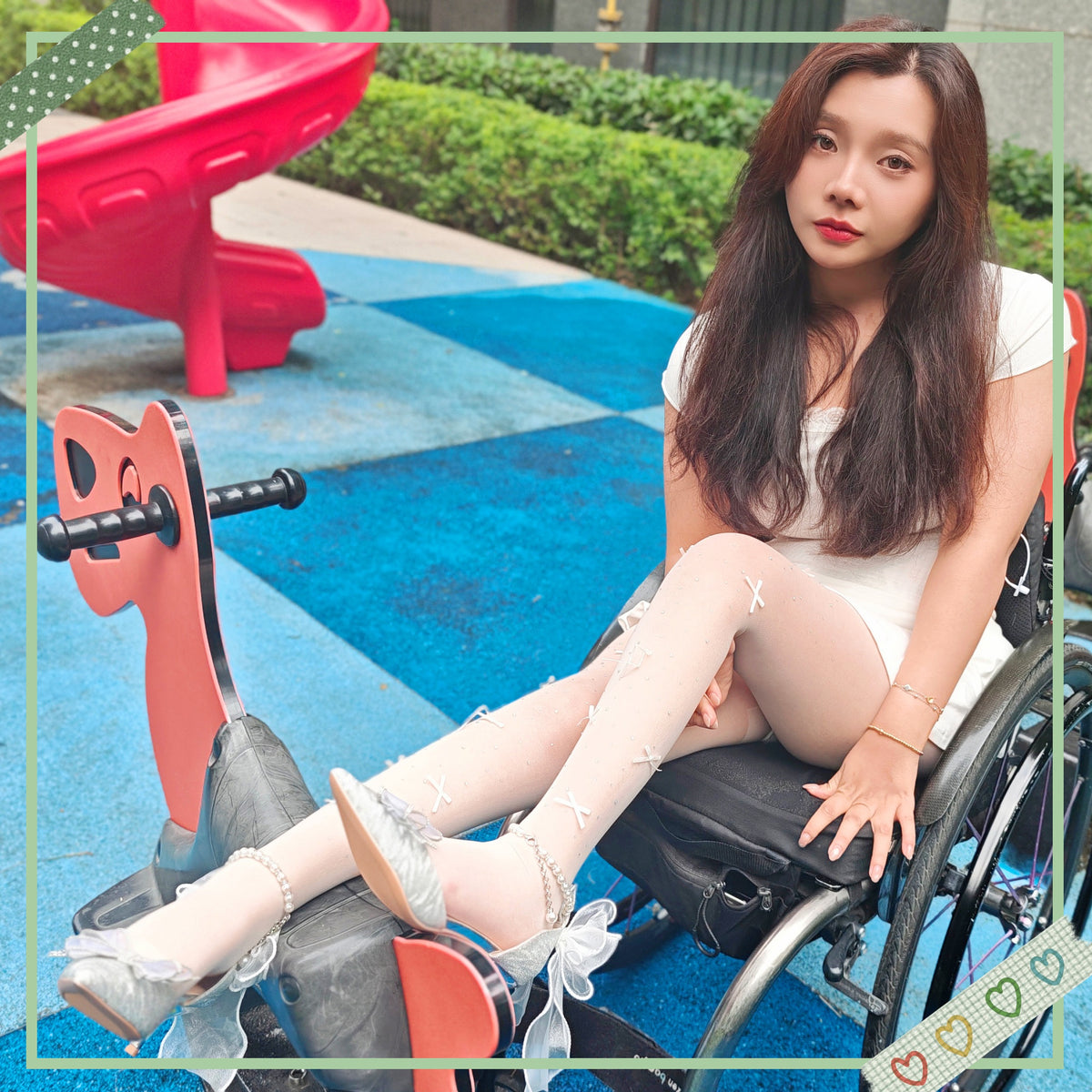 The Para Girl Kitty – Sliding down a slide in white stockings and high heels.