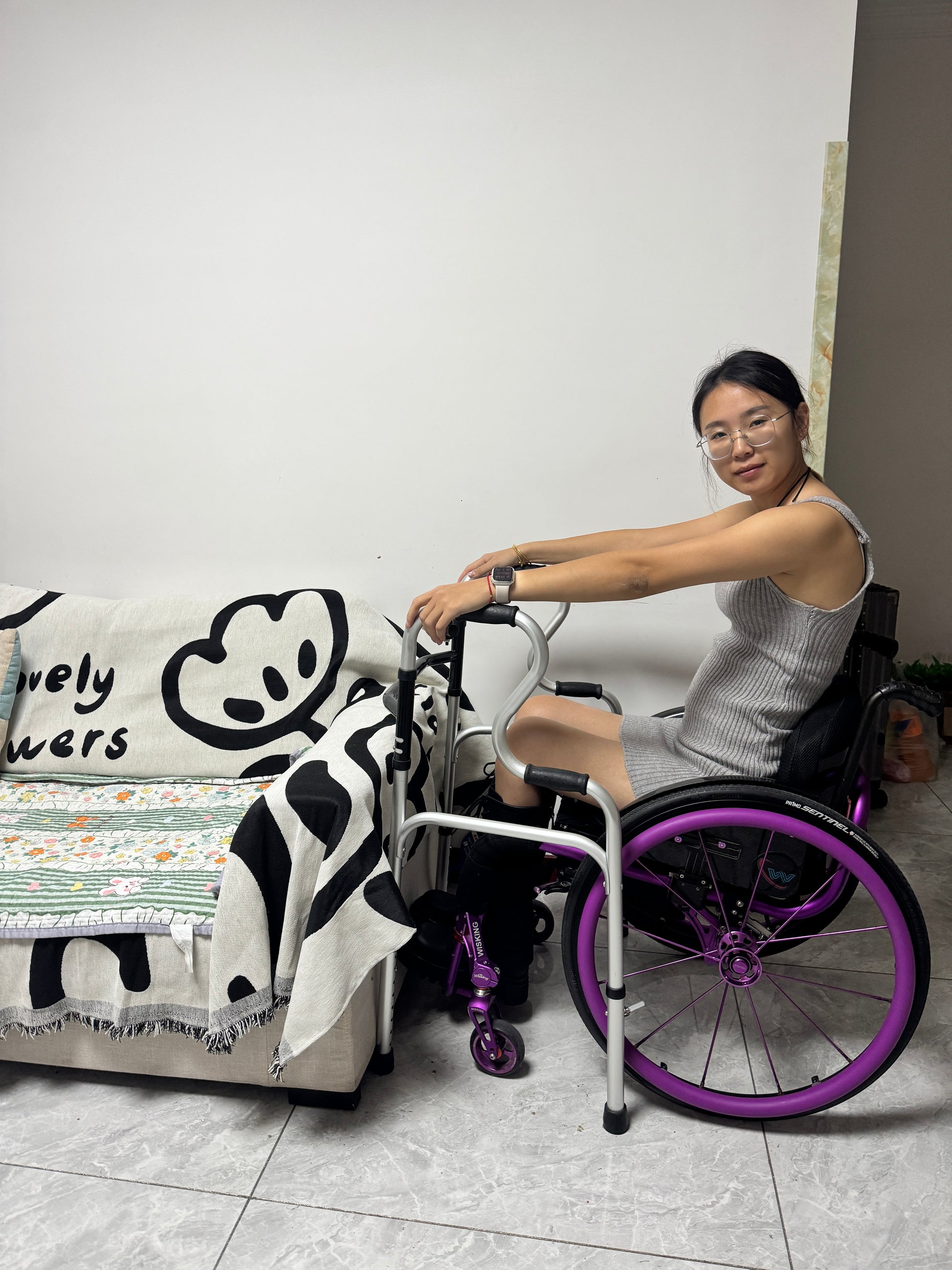 Zoe: Paraplegic Girl - Using her feet to play on her phone during rehabilitation training