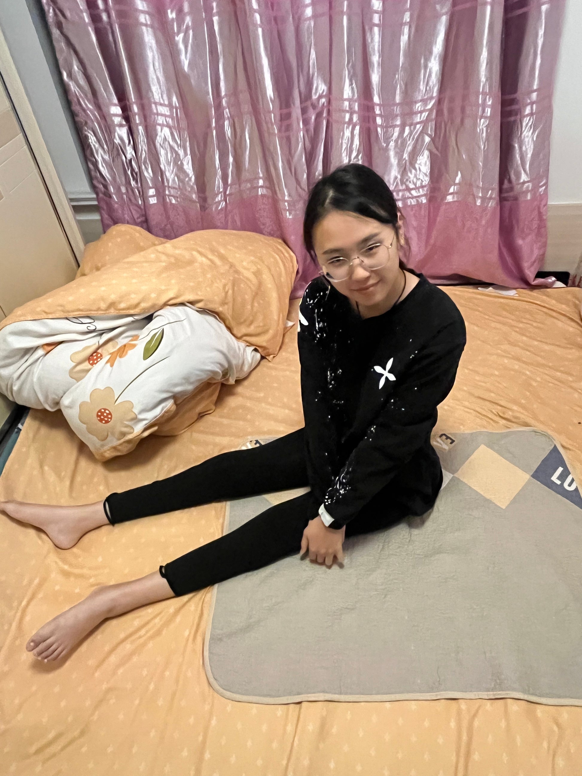 Zoe: Paraplegic Girl - Using her feet to play on her phone during rehabilitation training