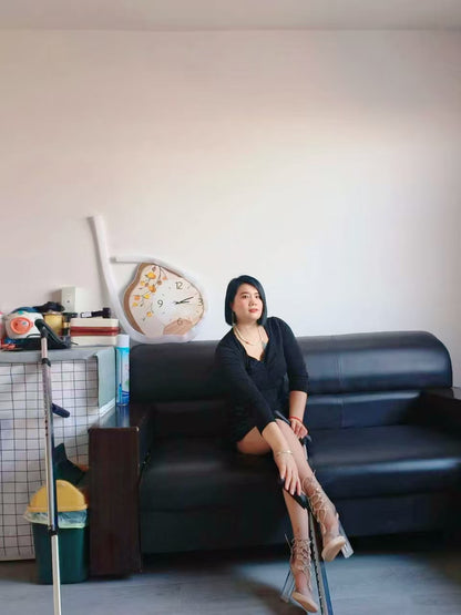 Carrie: A polio Lady patient walks around the house on crutches.