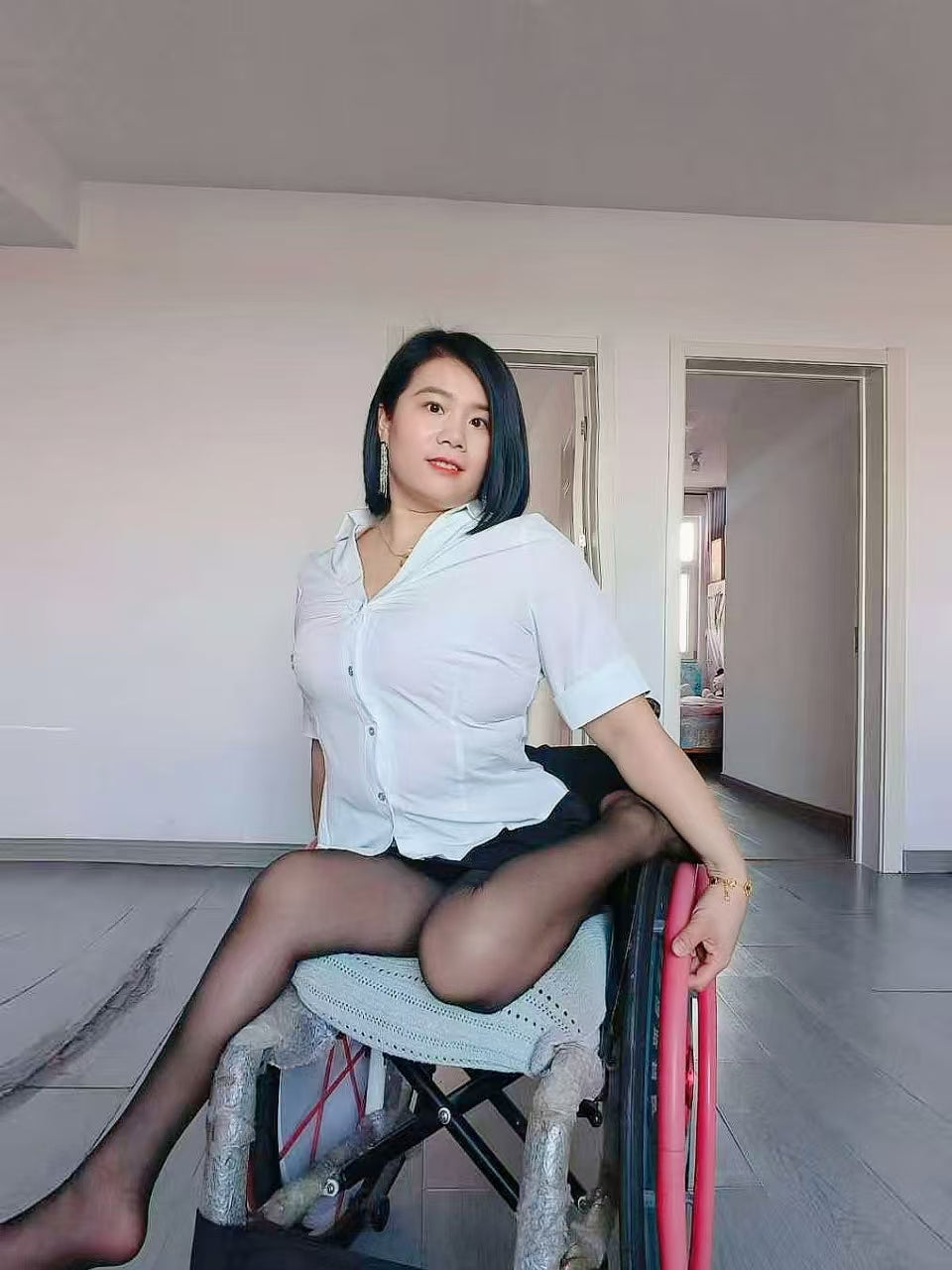 Carrie: The Polio Lady's sexy black stockings paired with a white shirt.