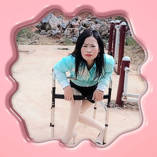 Susie: Polio lady exercising on exercise equipment AmputeeClub