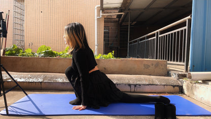 Miki: The girl doing yoga on the rooftop