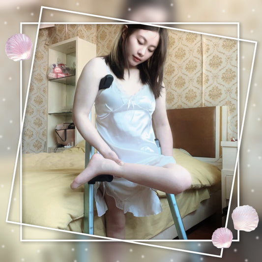 Miki: Cleaning and massaging the small feet for the Polio girl
