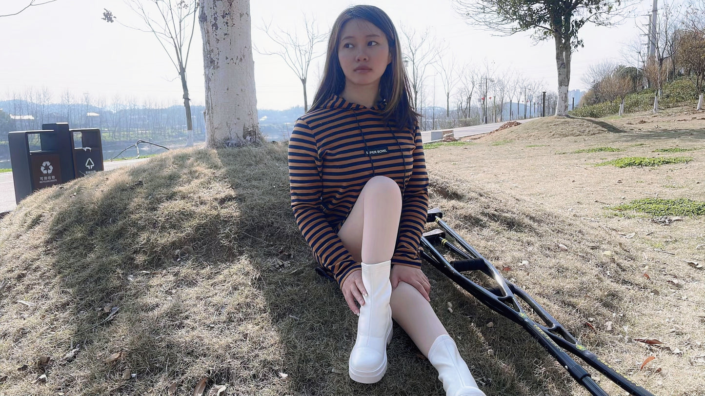 Miki: Cleaning and massaging the small feet for the Polio girl