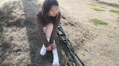 Miki: Cleaning and massaging the small feet for the Polio girl