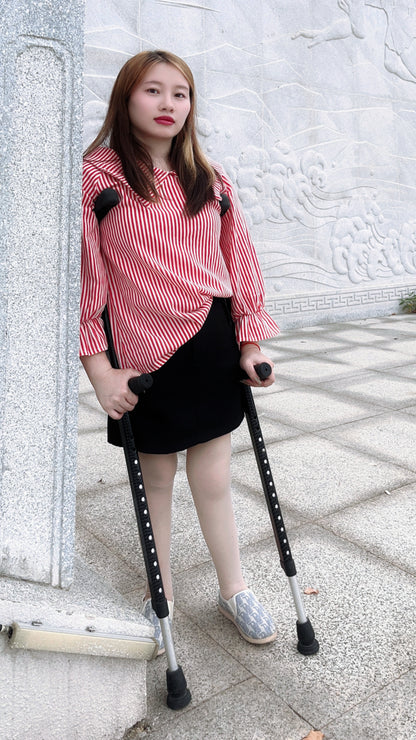 Miki: Polio Girl walks with crutches