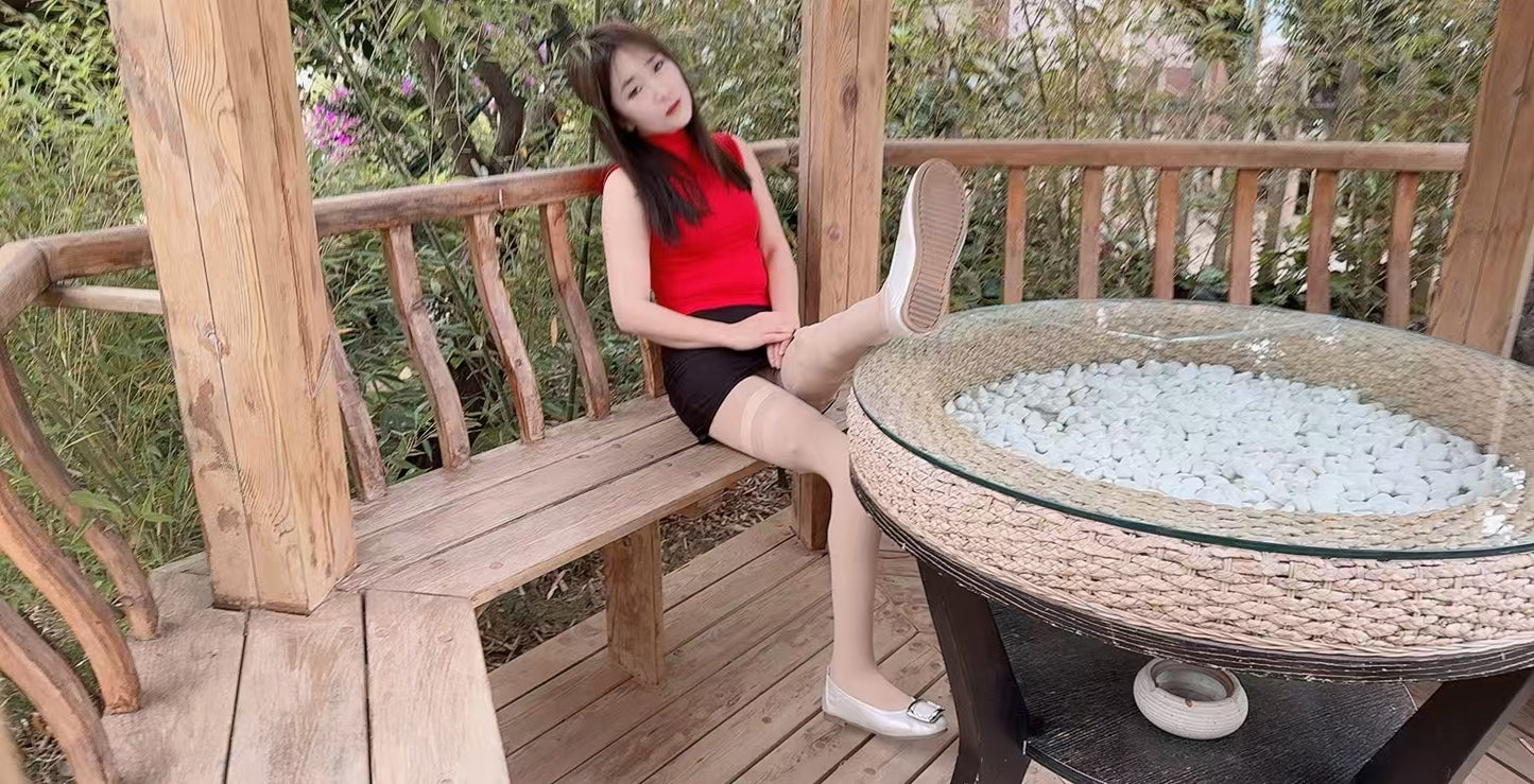 Sally: Dak Amputee Girl - Red clothed girl wearing a pair of prosthetic limbs