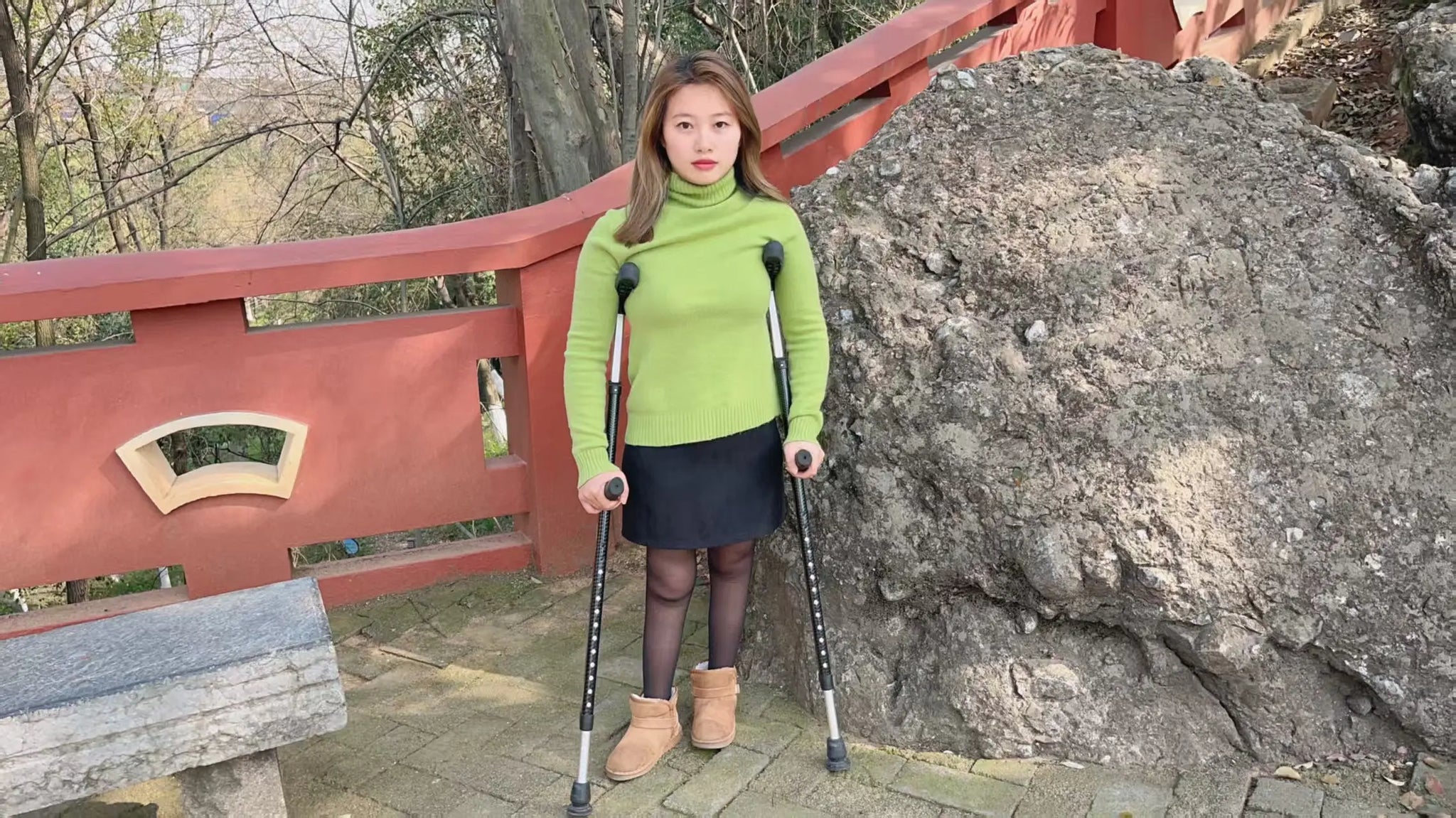 Miki: Polio Girl - Green clothed girl walks with crutches
