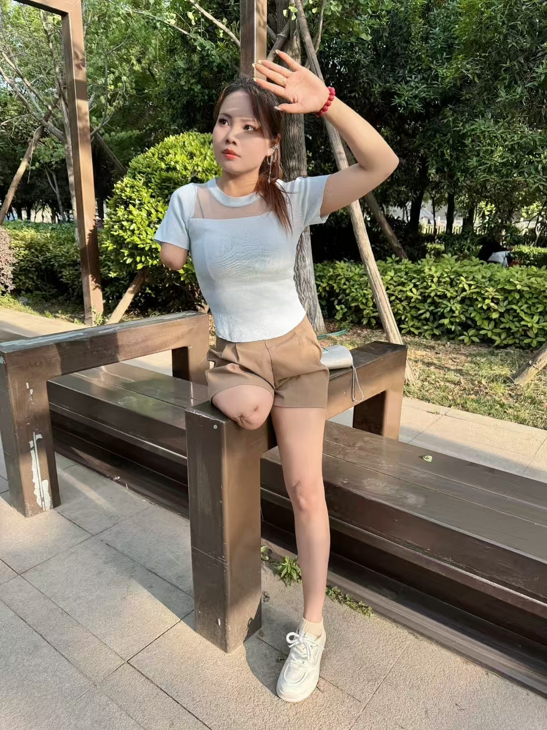Abby: Ooe Amputee Girl - hopping under the city walls - AmputeeClub