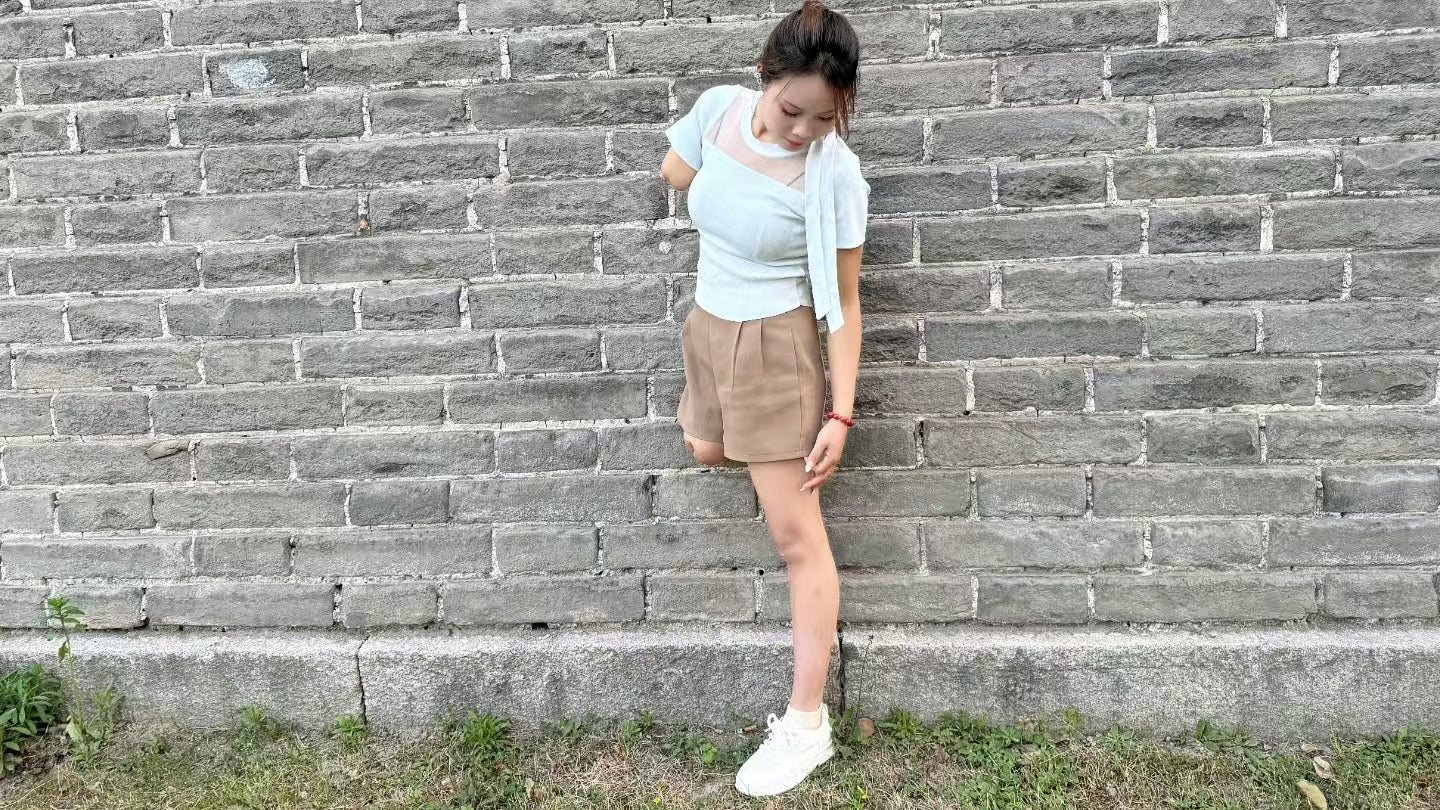 Abby: Ooe Amputee Girl - hopping under the city walls - AmputeeClub