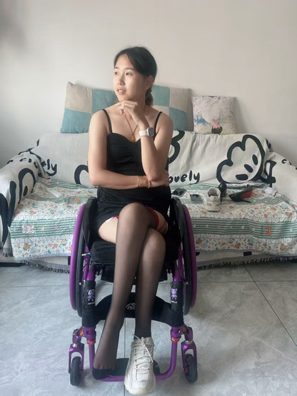 Zoe: Paraplegic Girl - rhinestone sandals and black stockings - AmputeeClub