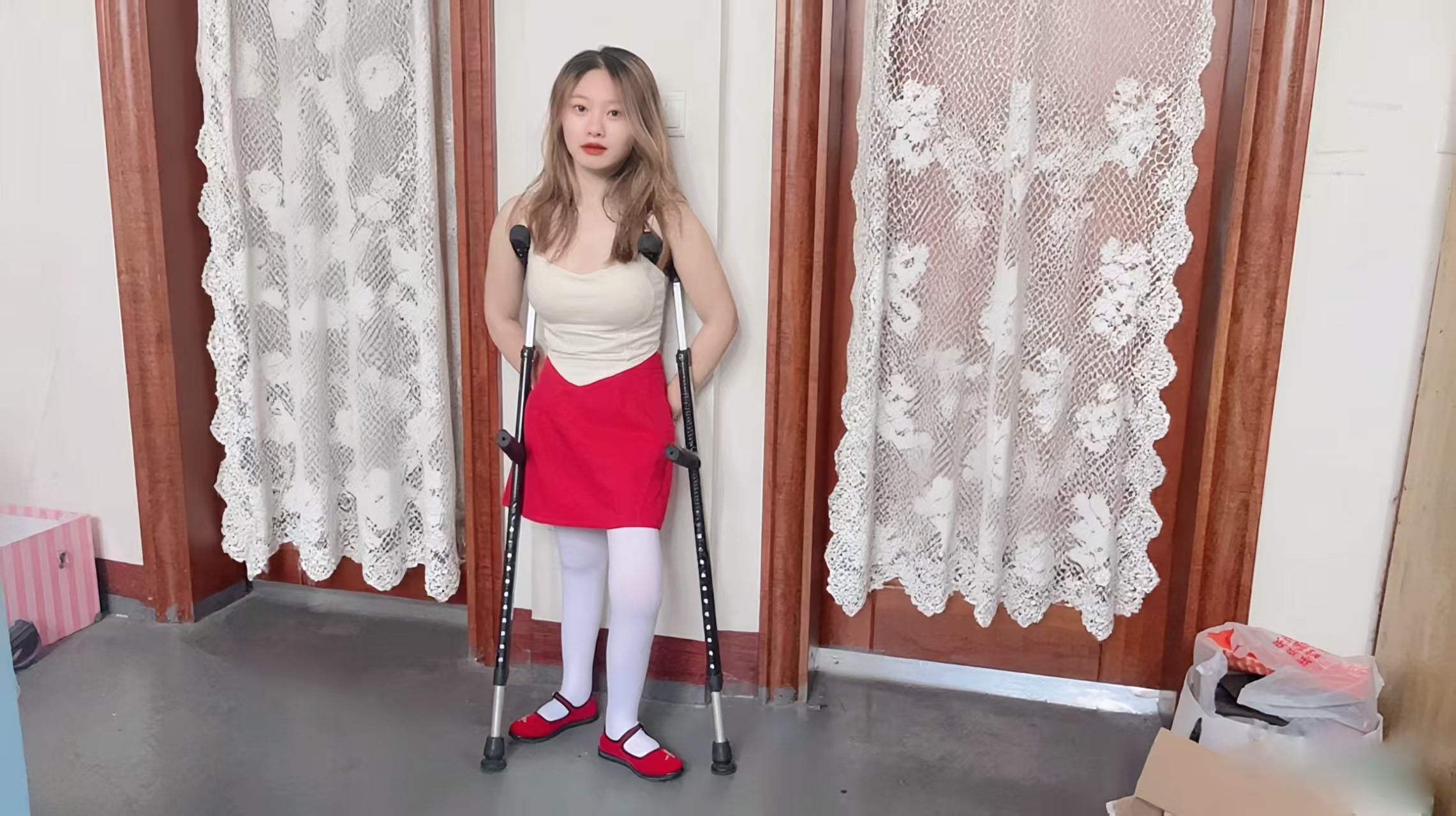Miki: Polio Girl - Red Shoes and White Socks - AmputeeClub