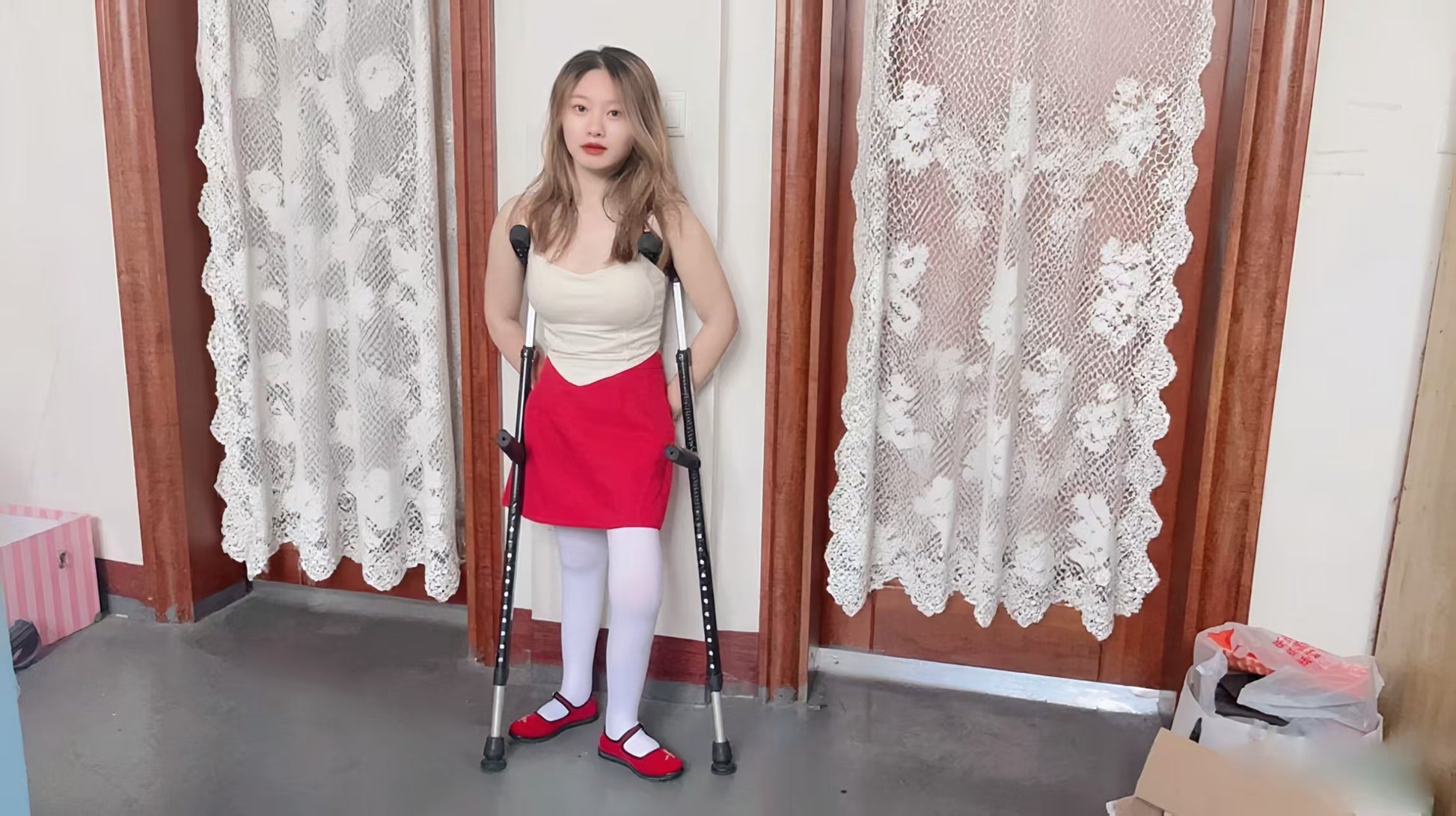 Miki: Polio Girl - Red Shoes and White Socks - AmputeeClub